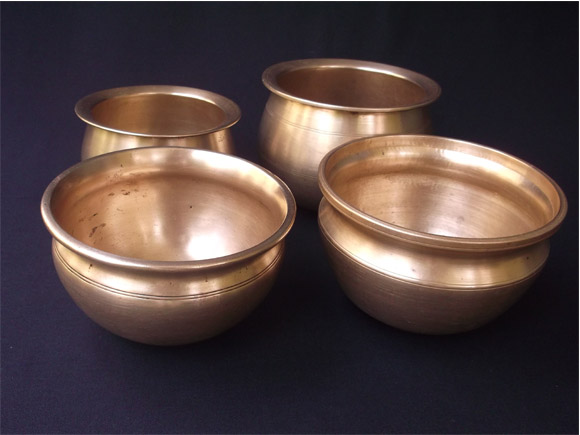 Antique Brass and Bronze curry pots in a group